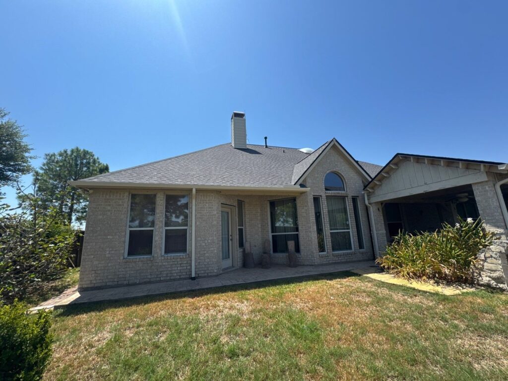 Completed roof replacement on the custom Pearland home